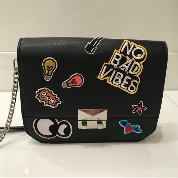 zara clutch bolsa man